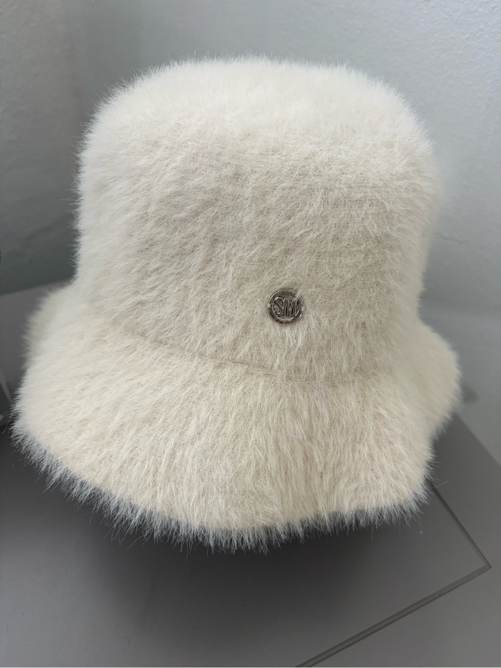 Steve Madden Ivory Fuzzy Bucket Hat with Logo Pin